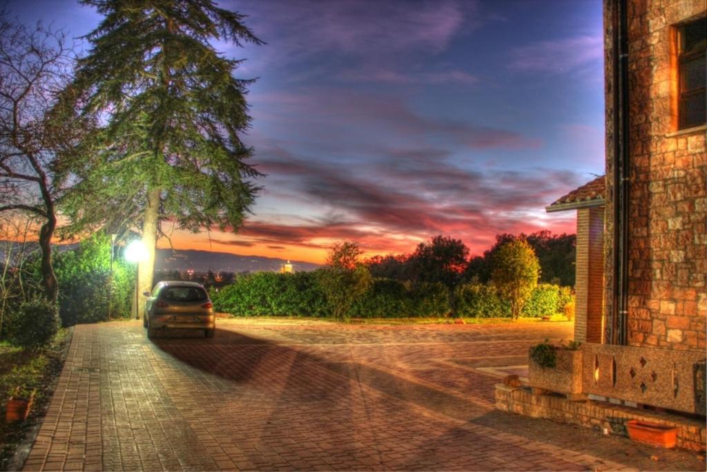 Assisi Garden Hotel Luaran gambar